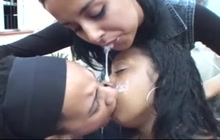 Lesbians kissing and spit swapping